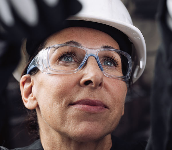 Woman wearing security glasses