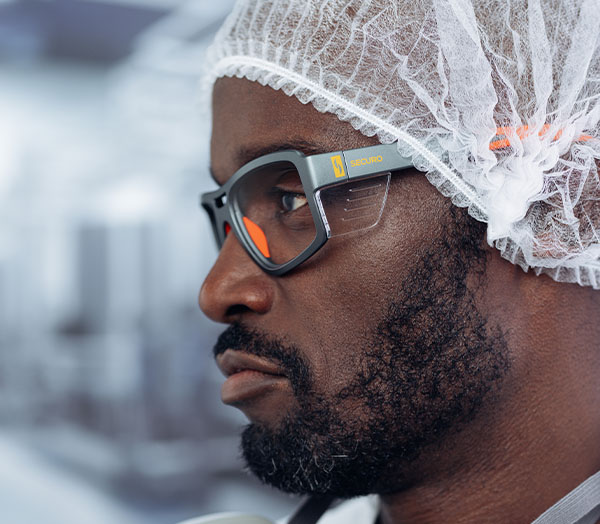 Man side profile wearing security frames